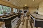 Lower level game room with shuffle board table and air hockey